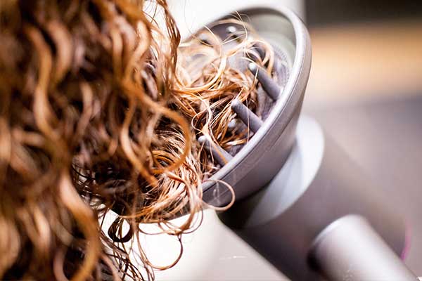 Curly hair takes different maintenance - learn about suitable haircuts with Cutting Crew Hair Salon.